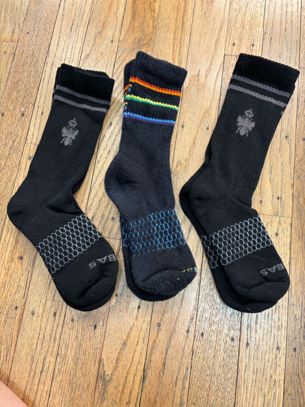 Bombas Black Crew Socks with Multicolor Rainbow Stripe Accent